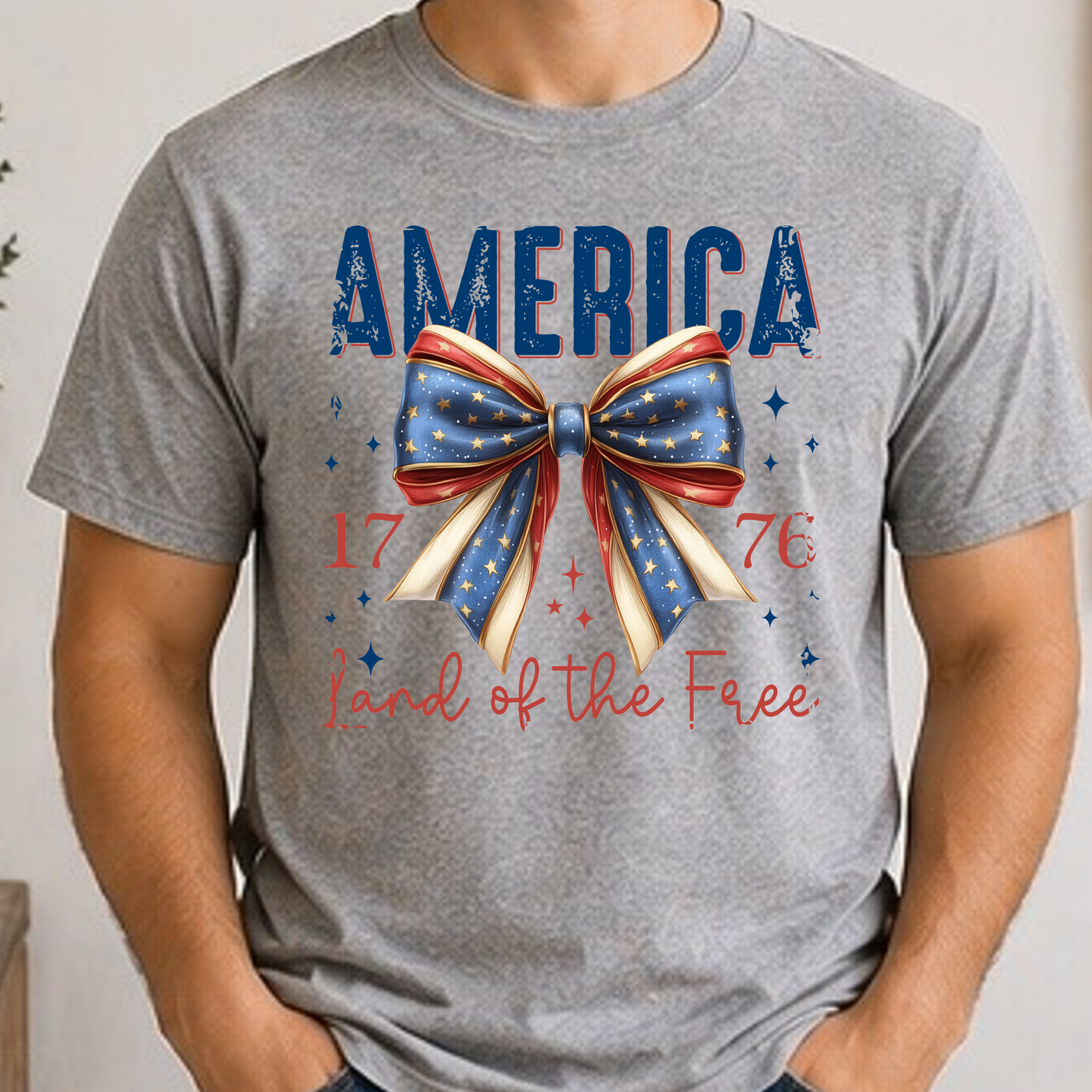 America 1776 Land of the Free Patriotic Bow Shirt | Fourth of July Americana Tee | Red White Blue Graphic T-Shirt